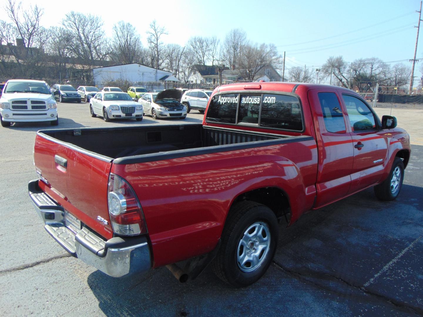 2009 Red Toyota Tacoma Access Cab (5TETX22N49Z) with an 4-Cyl 2.7 Liter engine, Manual, 5-Spd w/Overdrive transmission, located at 2105 Dixie Hwy, Louisville, KY, 40210, (502) 772-3333, 38.220932, -85.795441 - Photo#9